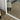 Full length box mirror in a hallway