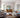 Extra large thin frame arch mirror leaning against a wall