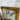 French Provincial gold mirror above a console table