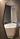 Geometric bevelled-edge mirror as a wall feature