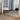 Coastal arch mirror in an entryway