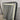 Curved LED mirror on its stand
