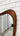 Ripple Asymmetrical Walnut Mirror - styled in contemporary living room