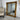 Antique gold French Provincial mirror above a mantel