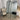Simplistic arch mirror standing in a dressing area