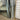 Black metal arch mirror full length view