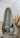 Organic pebble shaped mirror with a wooden frame