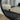 Round mesh mirror in a white finish