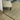 Thin frame mirror with rounded corners in a bedroom