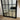 Arched window mirror on a feature wall