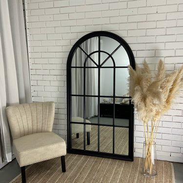 Arched grid window mirror in a white finish