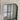 Contemporary rounded top mirror in a gold finish