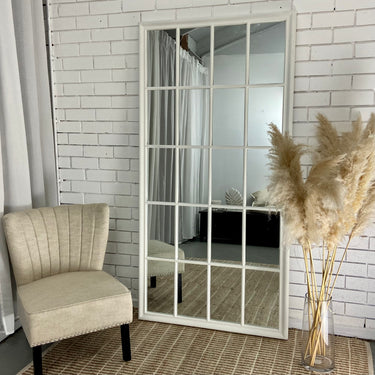 Wooden grid window mirror in a living room