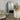 Slim metal arch wall mirror detail