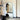 Black Luna LED arch mirror in a styled bedroom