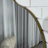 Lola Wave mirror in a black finish