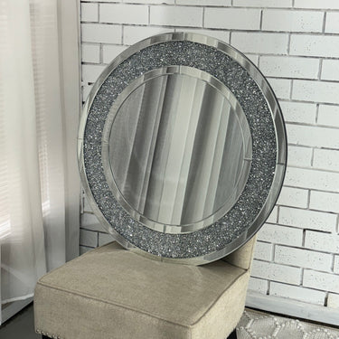Crystal swirl glass mirror on a wall