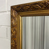 Antique ornate frame mirror close up