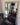 White slim frame mirror leaning against a wall in a living room