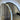 Luna arch LED mirror in gold in a dressing area