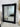 French Provincial black mirror in a hallway