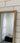 Wooden rectangle mirror in a living room