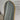 Freestanding arch mirror in a gold finish
