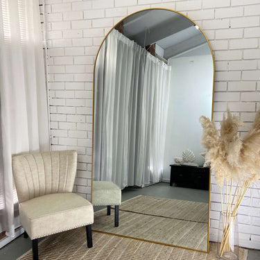 Gold 220cm XL Studio arch floor mirror in a styled room