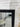 Black French Provincial mirror above a mantel