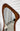 Solace Walnut Floor Mirror - close-up of organic frame shape and walnut grain