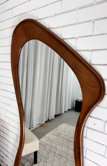 Solace Walnut Floor Mirror - close-up of organic frame shape and walnut grain