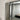 Tall beaded floor mirror leaning against a wall
