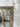 Champagne French Provincial mirror above a mantel