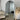 Temple arch mirror in a styled bedroom corner