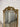 Rose Hamptons glam mirror reflecting a room