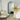 Areya slim arch mirror in a gold finish