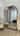 Coastal arch mirror in a walnut finish
