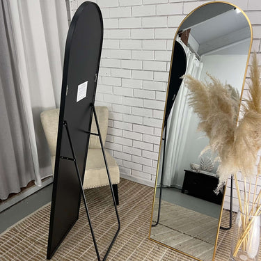 Freestanding arch mirror in a black finish