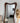 Ripple Asymmetrical Walnut Mirror - close-up of walnut wood grain and organic frame shape