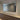 Royal gold curved rectangle mirror in a room