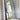 Thin frame full length mirror in a modern living room interior