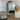 Temple arch mirror reflecting a modern interior