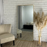 Royal gold curved mirror in a living room